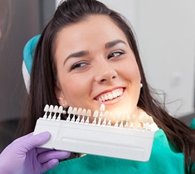 A woman smiling at a cosmetic dentist in Bloomfield Hills.