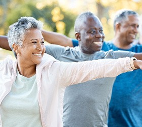 Adults smiling in workout class
