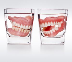 Dentures in Bloomfield Hills will not only feel good and look natural, but they will also give your smile purpose again. 