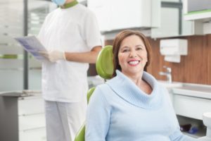 smiling woman at dentist office