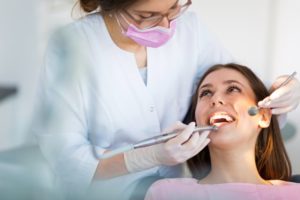Patient receiving care from dentist in Bloomfield Hills, MI