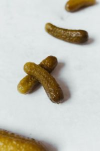 Pickles spread out on table