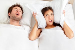 Snoring man with woman who can’t sleep